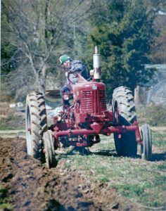 Pop-plowing-w-Farmall-805x1024